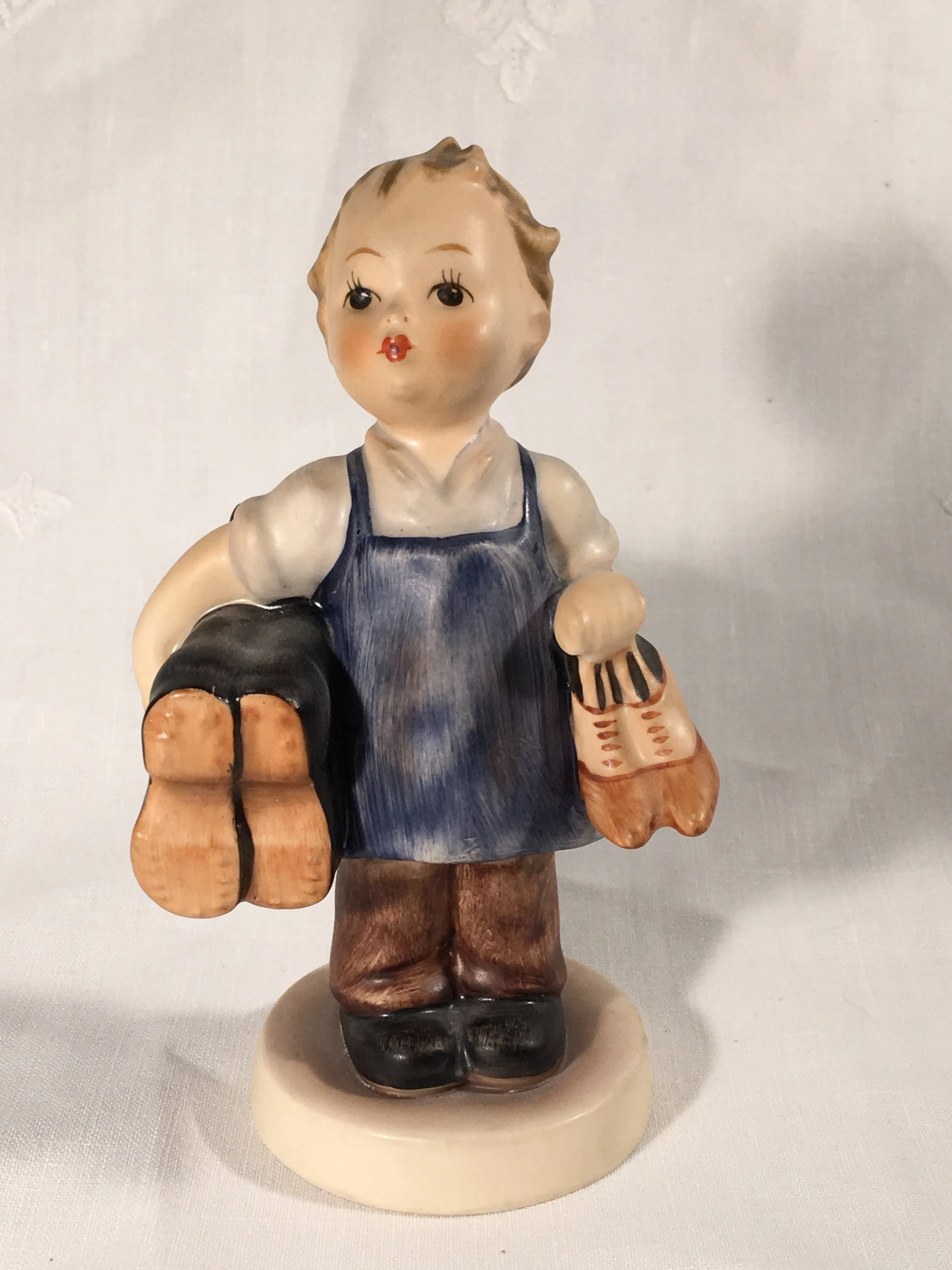 Goebel Hummel TMK3 #143/0 "Boots" (Boy Carrying Boots) 5" Tall